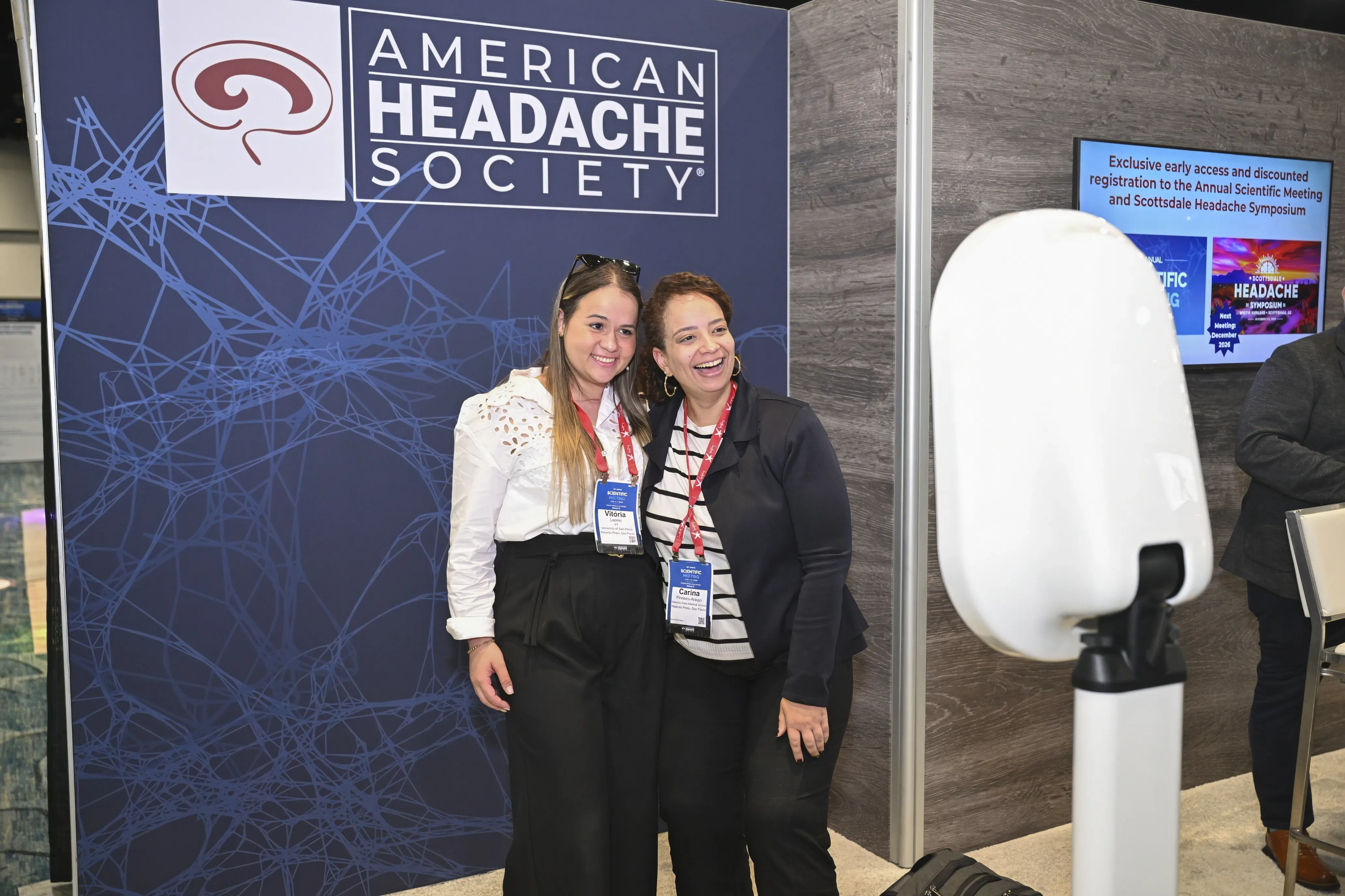 Annual Scientific Meeting attendees smiling.